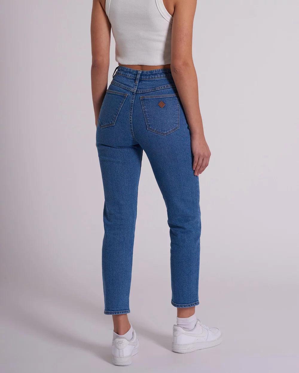 94 High Slim Liliana Jeans - Mid Blue by Abrand Jeans - in 8/26 | SWAACE